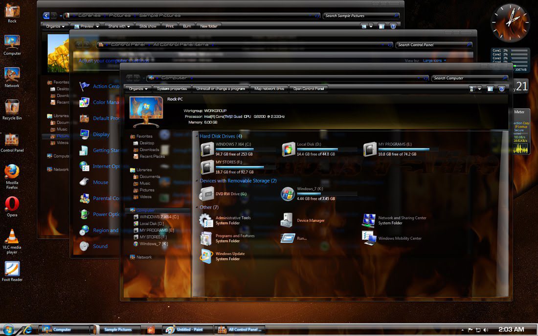 Computer Screen Displaying Fire And Other Items On Windows Xp Gamer Edition.